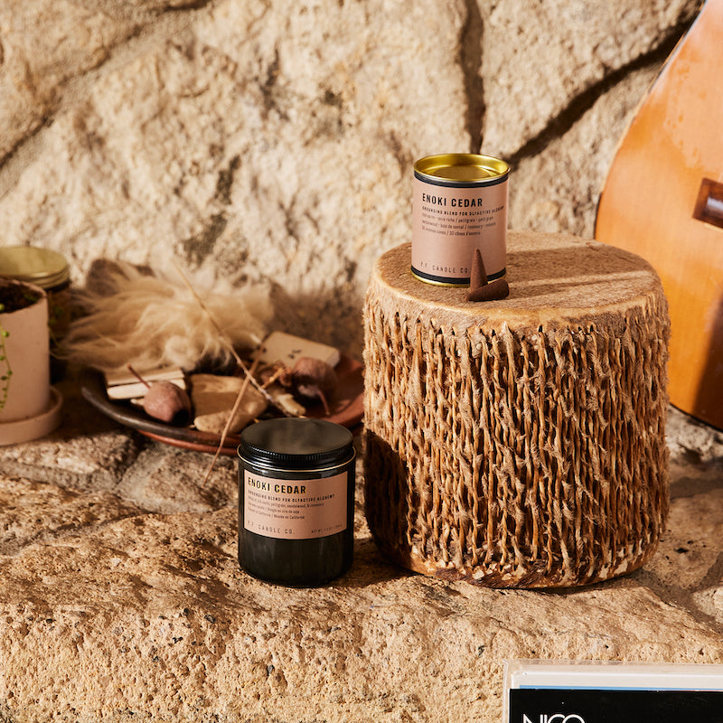 P.F. Candle Co. Enoki Cedar - Scent Family - Alchemy is a collection of candles and incense cones featuring science-backed blends meant to mimic the healing qualities of nature and boost your mood.
