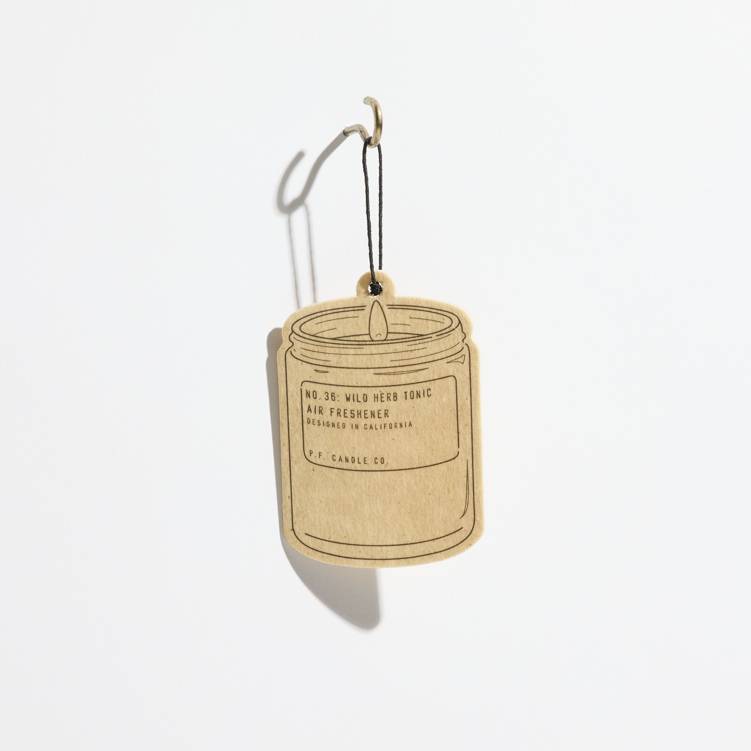 Wild Herb Tonic – Air Freshener hanging on hook