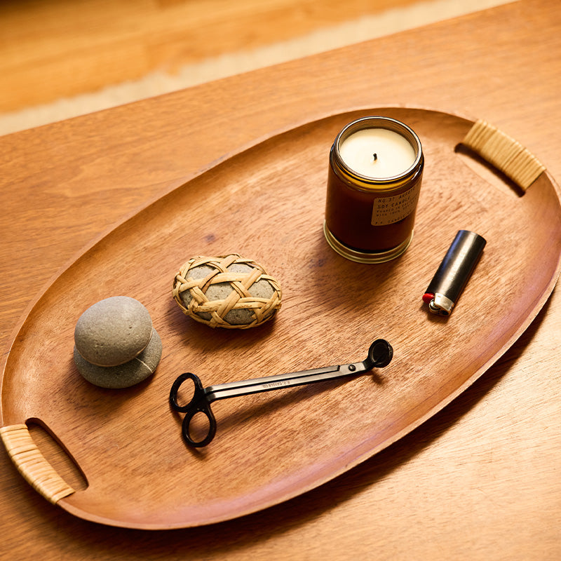 P.F. Candle Co. Wholesale - P.F. Candle Co. Branded Wick Trimmer - Lifestyle - Heavy duty yet lightweight, they provide a clean and precise cut, and catch excess trimmings for disposal. Enjoy your favorite P.F. fragrance to its fullest with our sleek new candle companion!