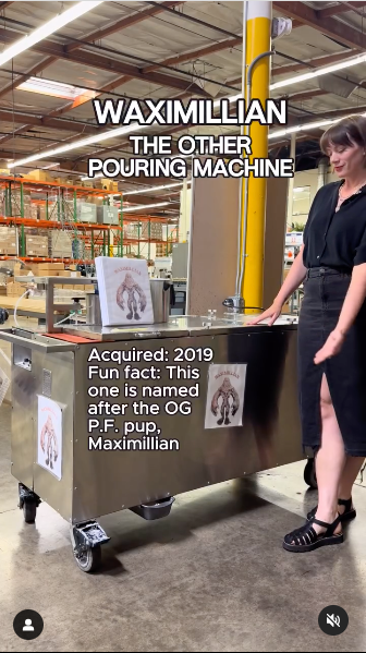 The Waximillan pouring machine is actively pouring material, showcasing its design and efficiency in production.